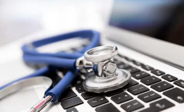 healthcare stethoscope and laptop