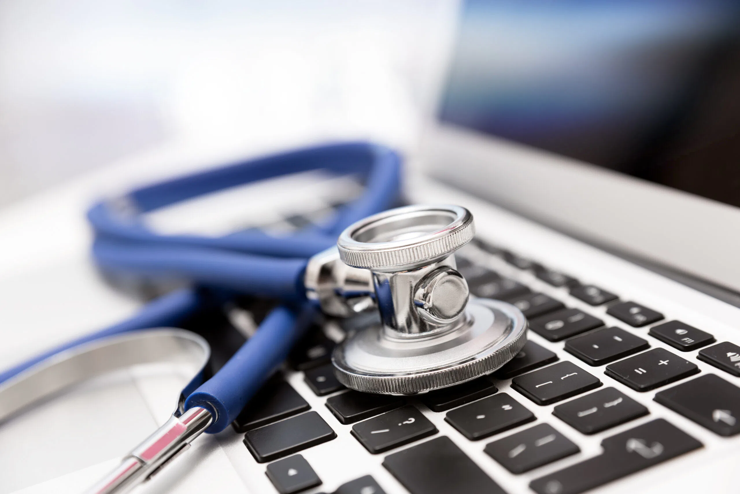 healthcare stethoscope and laptop