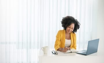 female working with laptop